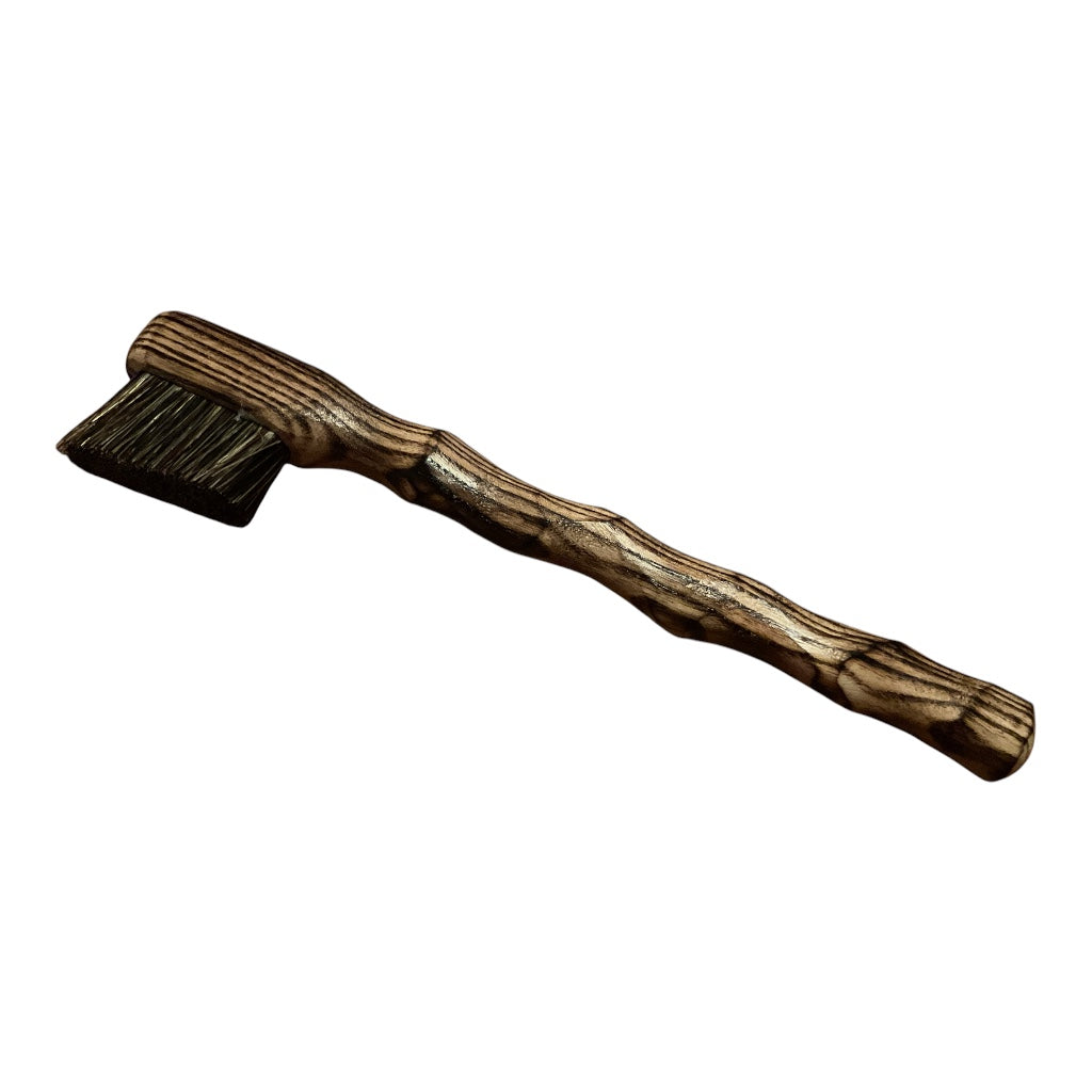 lightly scorched ash. small brush